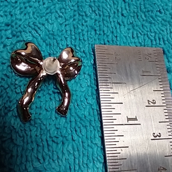 Goldtone bow pierced post earrings - Picture 2 of 4